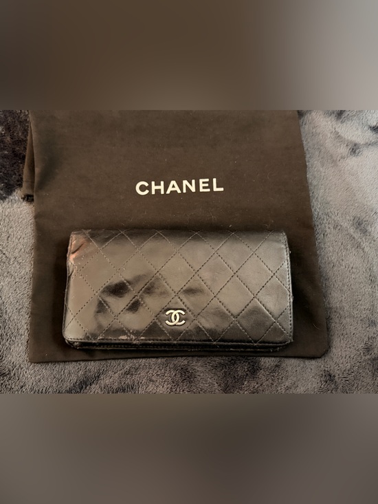 CHANEL Handbags - CHANEL Black Quilted Lambskin Wallet with Silver CC Emblem